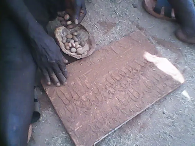 A Diviner casting lots