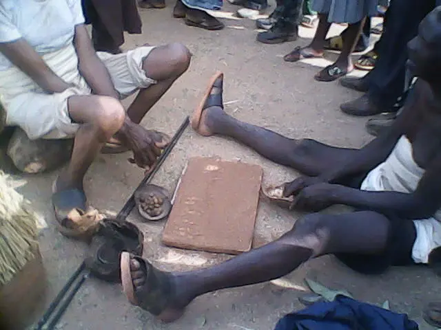 A Diviner casting lots